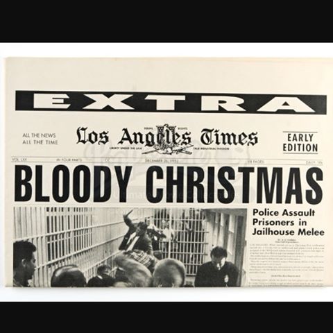 A still from the movie L.A. Confidential, showing a Los Angeles Times front-page story with the headline "BLOODY CHRISTMAS Police Assault Prisoners in Jailhouse Melee"