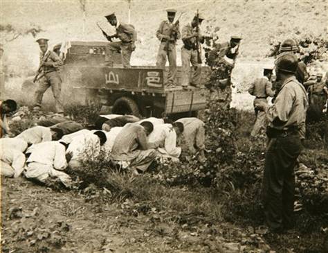 A U.S. Army photograph depicting the execution of political prisoners by the South Korean military and police at Daejeon, South Korea, July 1950 [Wikipedia]