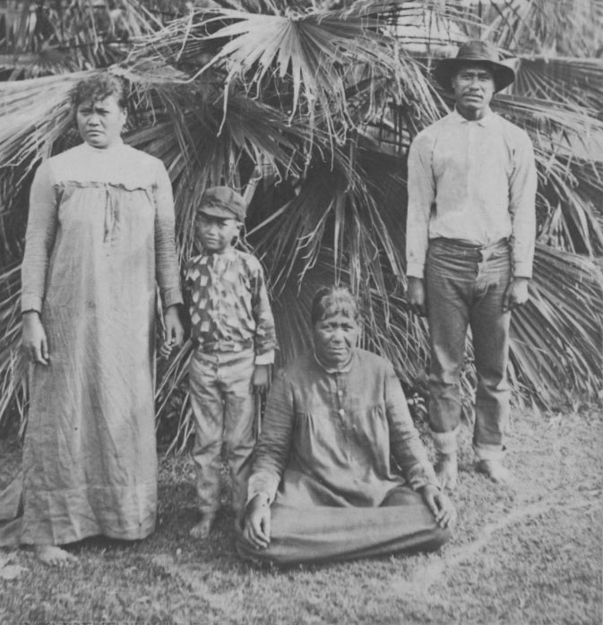 Pi'ilani and Kaluaiko'olau, or Ko'olau, with their son, Kaleimanu, and an unidentified woman believed to be Kaluaiko'olau's mother, Kukui Kaleimanu. From the Hawaii State Archives [Wikipedia]