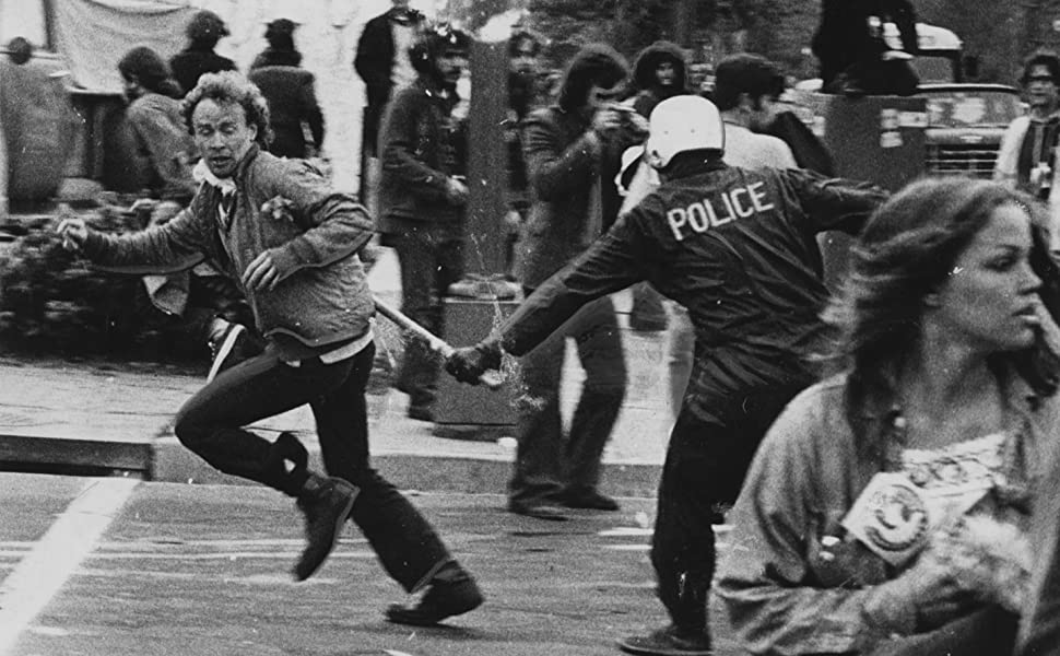 Riot squads sweep aggressively through D.C. neighborhoods. Photo by Douglas Chevalier/Washington Post
