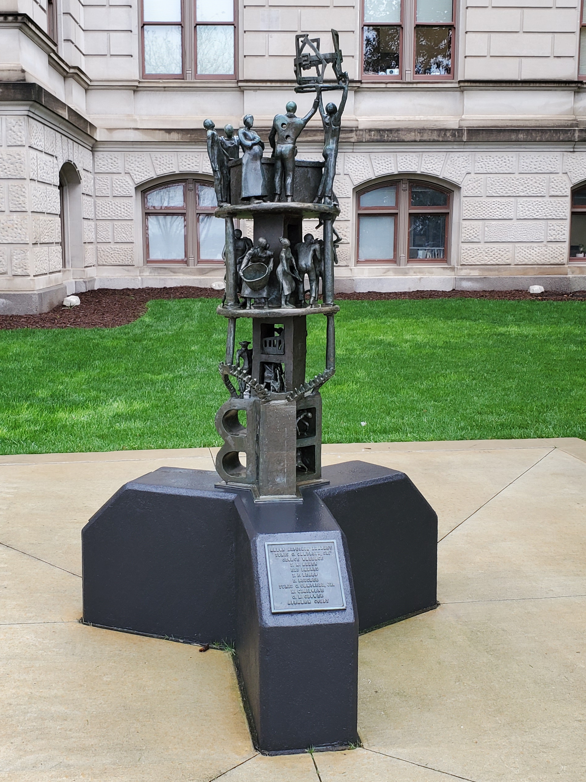 A statue commemorating the Original 33 on the grounds of the Georgia State Capitol, titled "Expelled Because of Color" (1973) [Wikipedia]