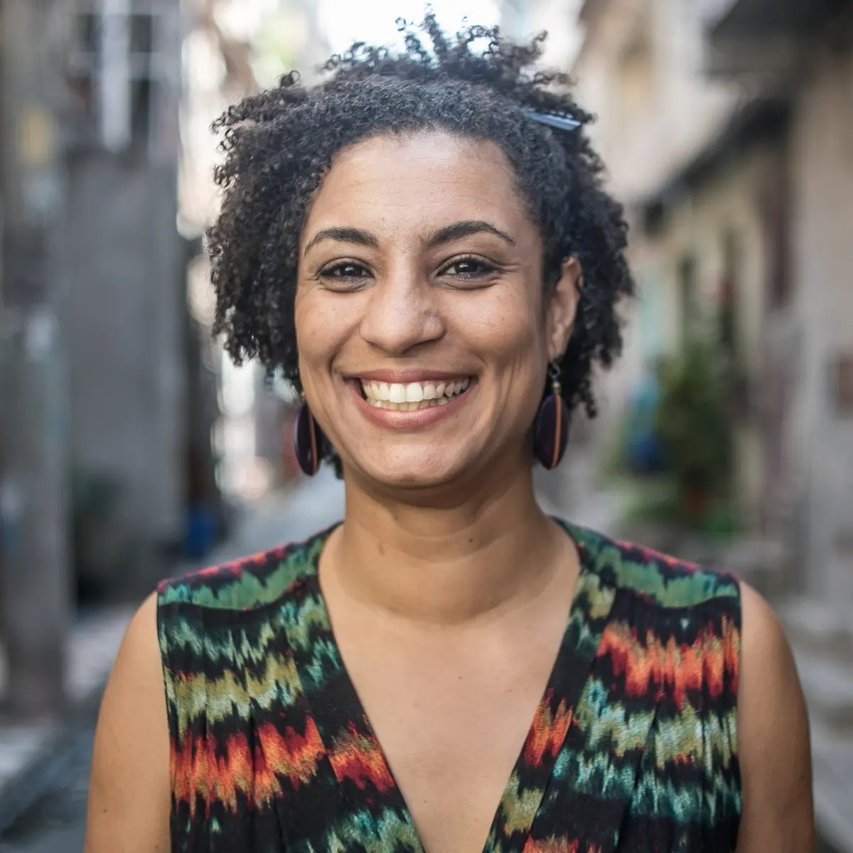 A photo portrait of Marielle Franco. Photograph by Mídia Ninja [The Guardian]