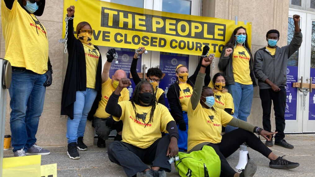 A group of KC Tenants members shutting down eviction hearings in Kansas City by blocking the doors to the courthouse, January 2021 [krcgtv.com]